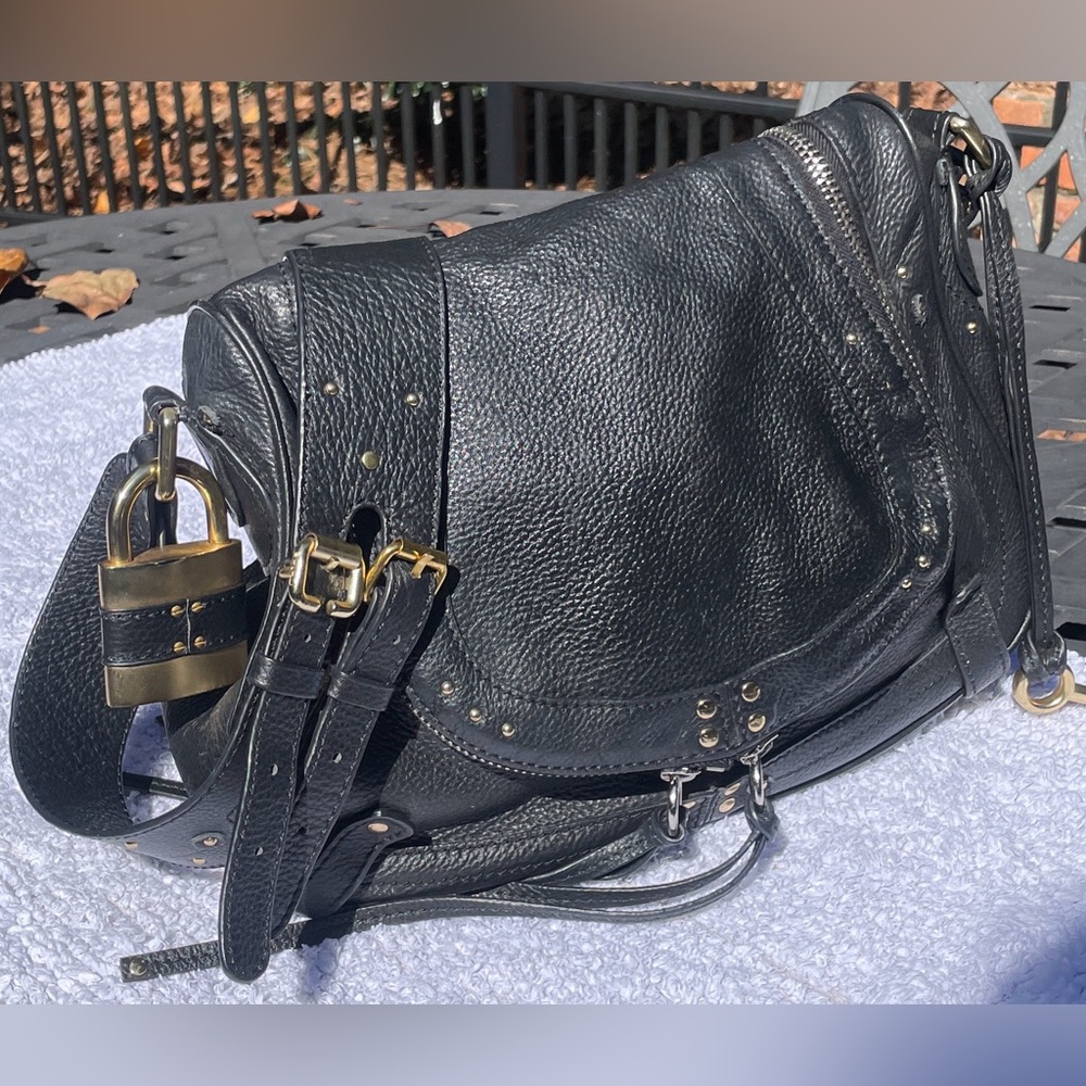 Leather saddlebag with brass hardware